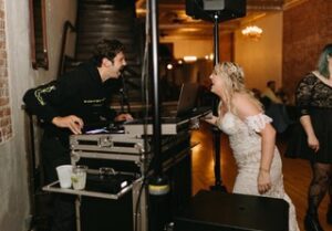 bride singing with dj