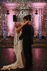 bride and groom slow dancing